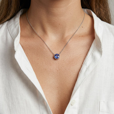 tanzanite birthstone necklace in white gold finish — model view