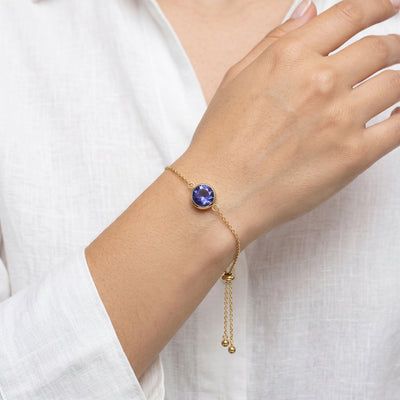 tanzanite birthstone bracelet in yellow gold finish — model view