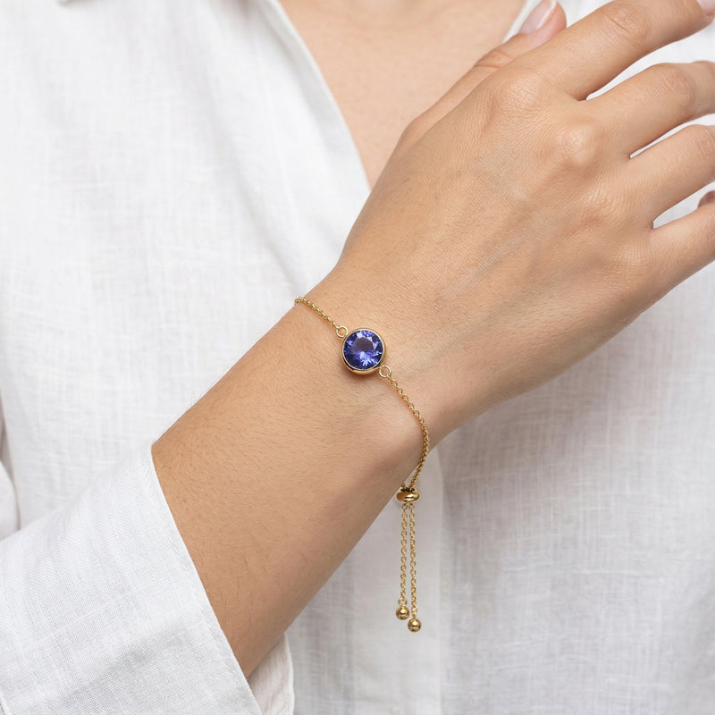 tanzanite birthstone bracelet in yellow gold finish — model view