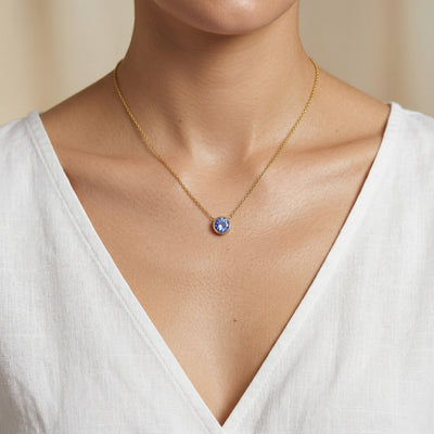 tanzanite birthstone necklace in yellow gold finish — model view