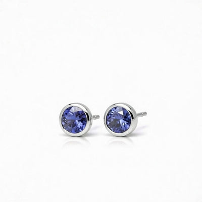 tanzanite birthstone stud earrings in white gold finish — side view