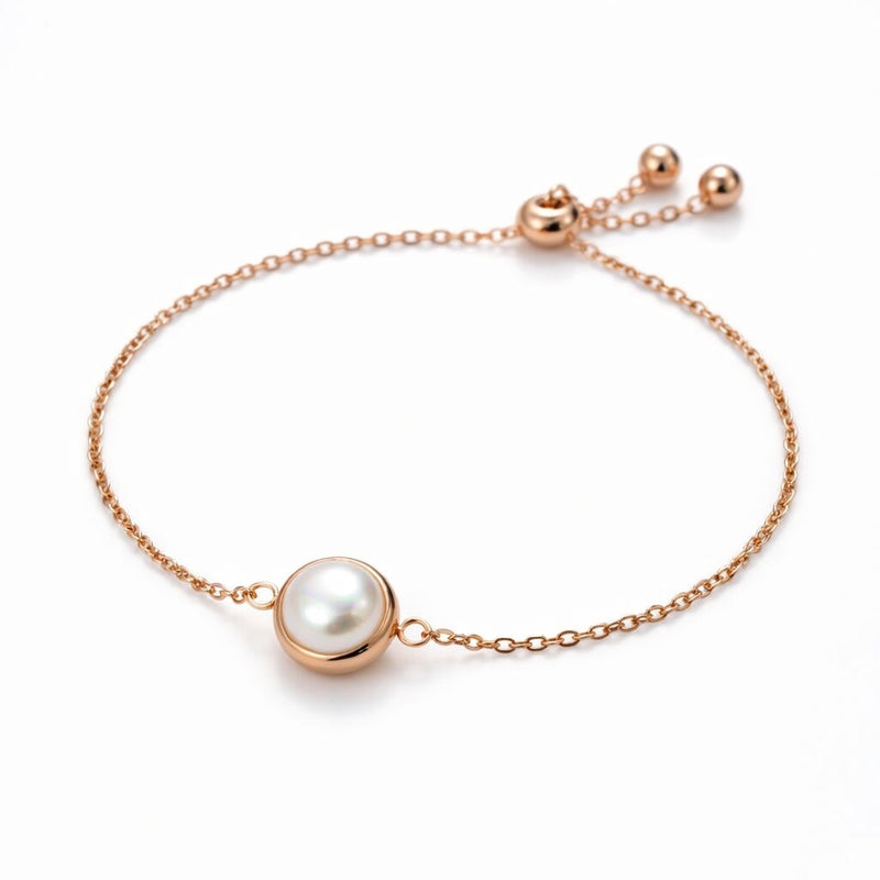 pearl birthstone bracelet in rose gold finish — front view