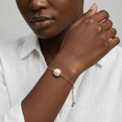 pearl birthstone bracelet in rose gold finish — model view