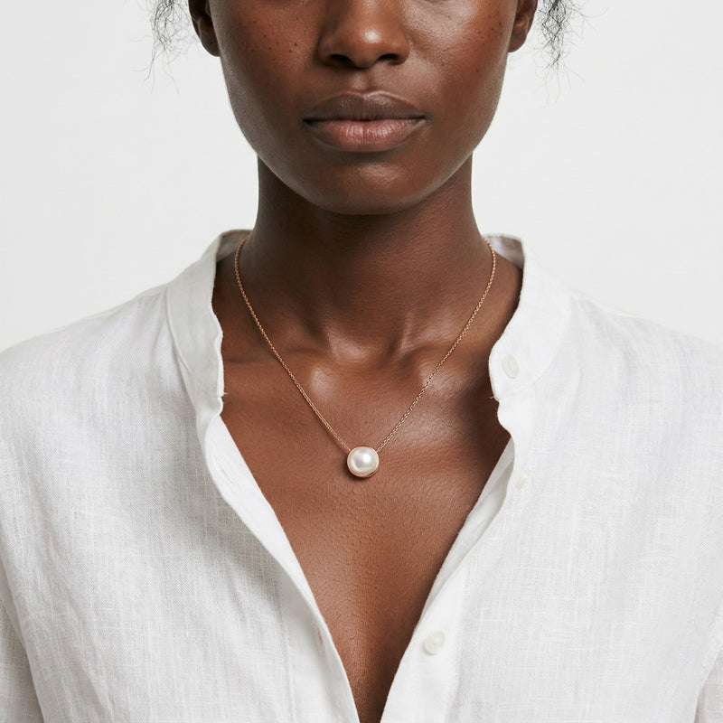 pearl birthstone necklace in rose gold finish — model view