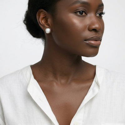 pearl birthstone stud earrings in white gold finish — model view