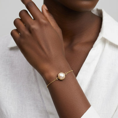 pearl birthstone bracelet in yellow gold finish — model view