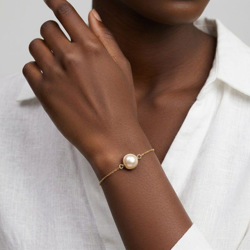 pearl birthstone bracelet in yellow gold finish — model view