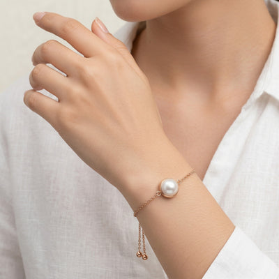 pearl birthstone bracelet in rose gold finish — model view