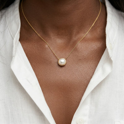 pearl birthstone necklace in yellow gold finish — model view