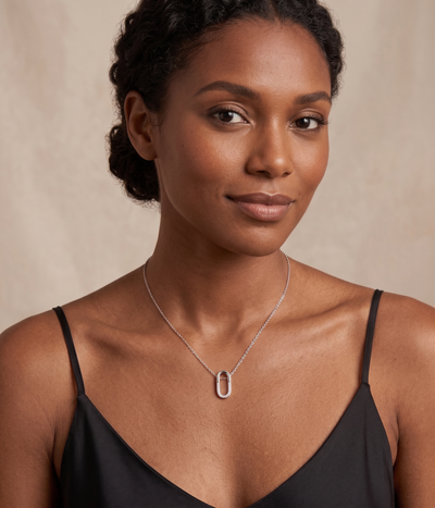 oval pavé pendant necklace in white gold finish — model view
