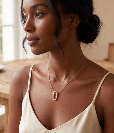 oval pavé pendant necklace in yellow gold finish — model view