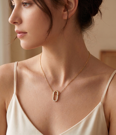 oval pavé pendant necklace in yellow gold finish — model view