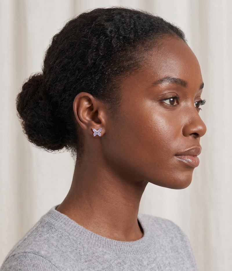 alexandrite butterfly stud earrings in white gold finish — model view