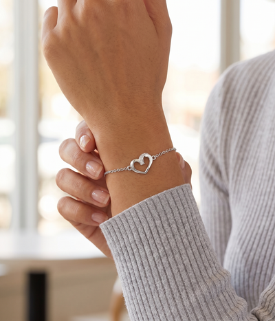twisted heart bracelet in white gold finish — model view