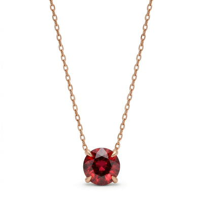 garnet birthstone necklace in rose gold finish — front view