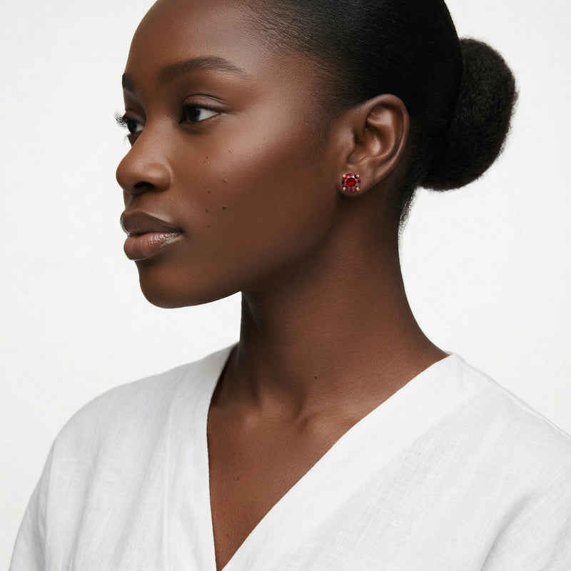 garnet birthstone stud earrings in yellow gold finish — model view