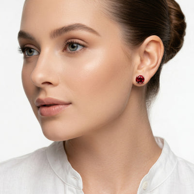 garnet birthstone stud earrings in white gold finish — model view