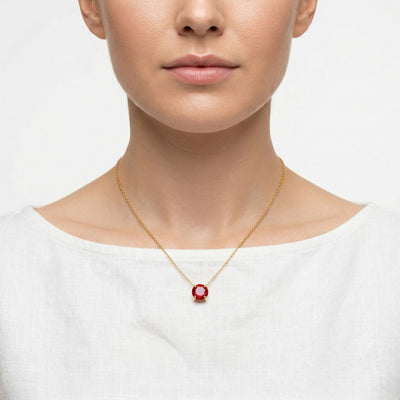 garnet birthstone necklace in yellow gold finish — model view
