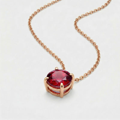 garnet birthstone necklace in rose gold finish — side view