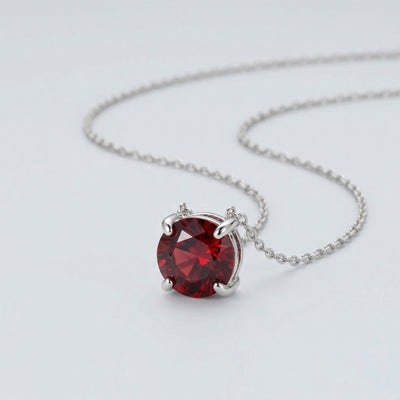 garnet birthstone necklace in white gold finish — side view