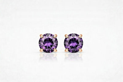 amethyst birthstone stud earrings in rose gold finish — front view