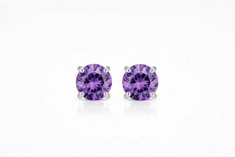 amethyst birthstone stud earrings in white gold finish — front view