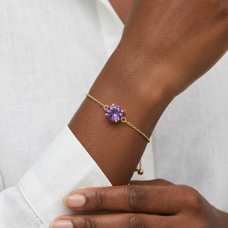 amethyst birthstone bracelet in yellow gold finish — model view