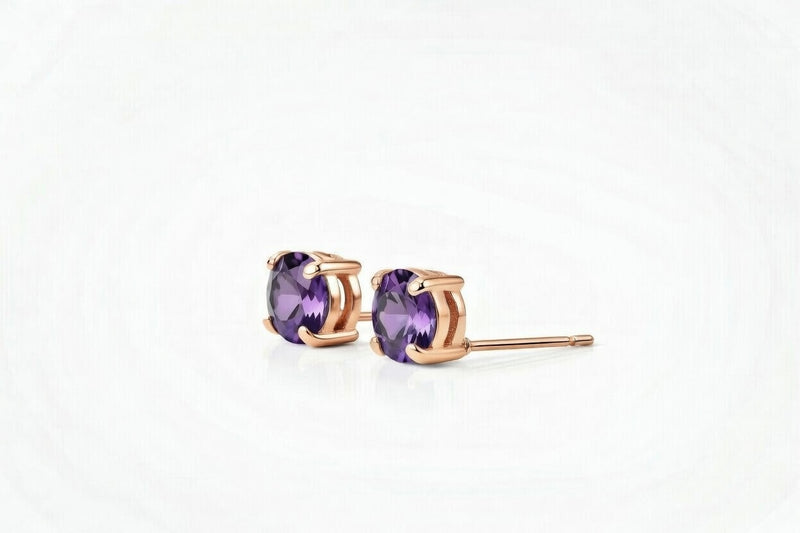 amethyst birthstone stud earrings in rose gold finish — side view