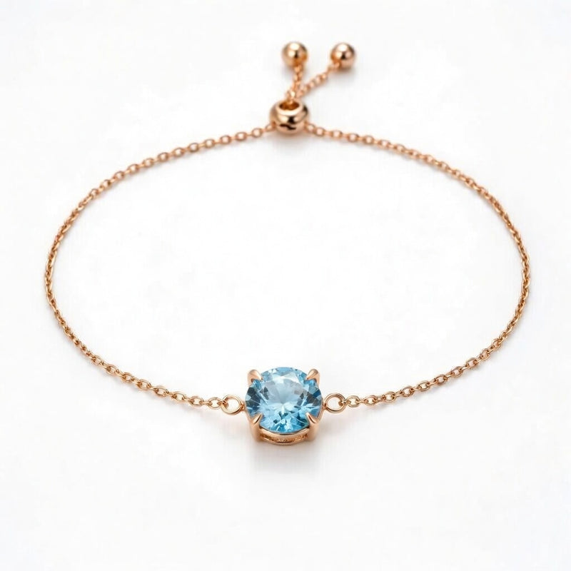 aquamarine birthstone bracelet in rose gold finish — front view