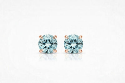 aquamarine birthstone stud earrings in rose gold finish — front view