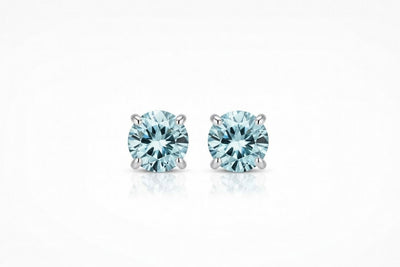 aquamarine birthstone stud earrings in white gold finish — front view