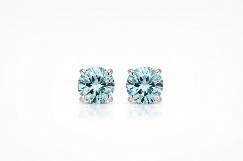aquamarine birthstone stud earrings in white gold finish — front view