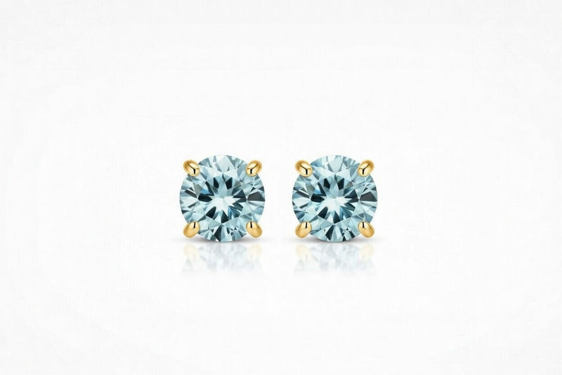 aquamarine birthstone stud earrings in yellow gold finish — front view