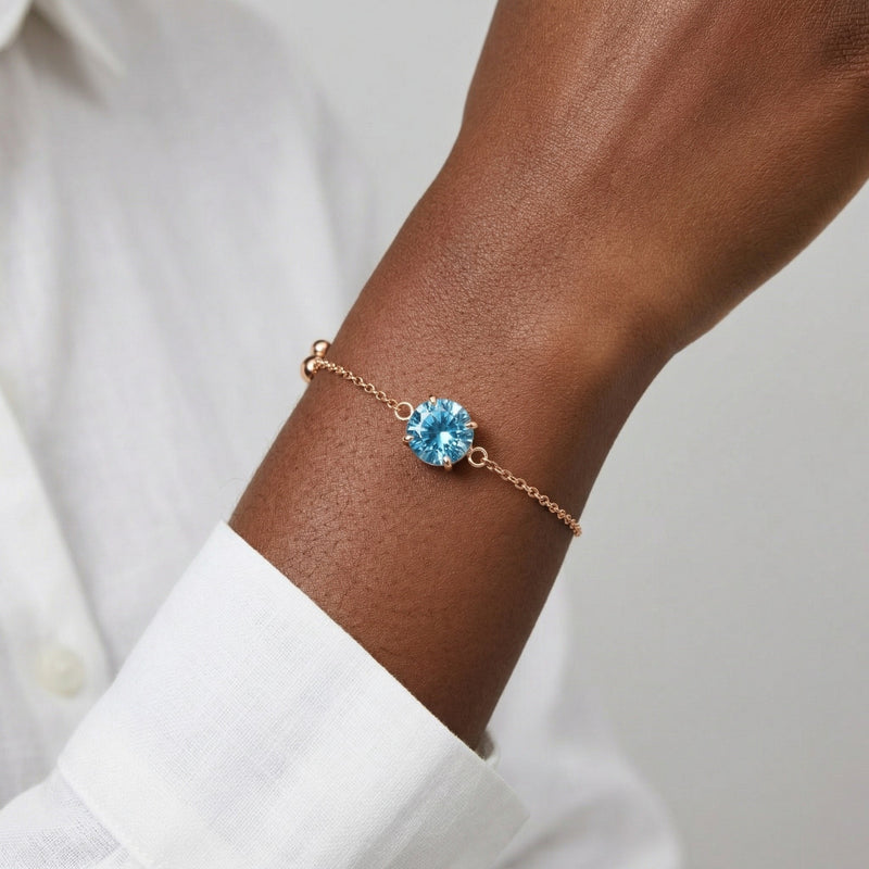 aquamarine birthstone bracelet in rose gold finish — model view