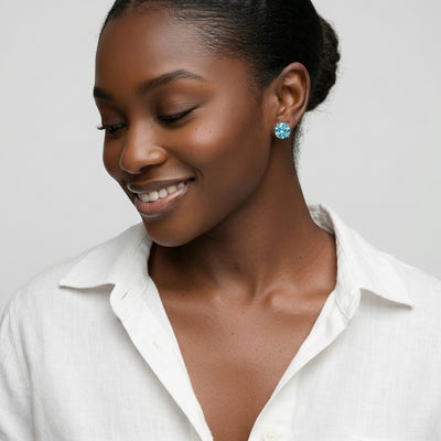 aquamarine birthstone stud earrings in rose gold finish — model view