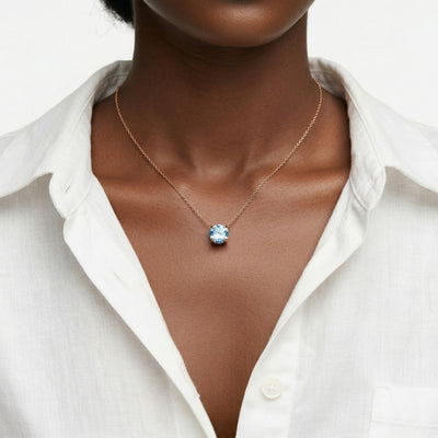 aquamarine birthstone necklace in rose gold finish — model view