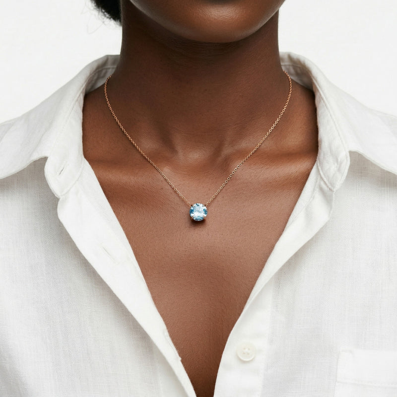 aquamarine birthstone necklace in rose gold finish — model view