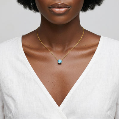 aquamarine birthstone necklace in yellow gold finish — model view