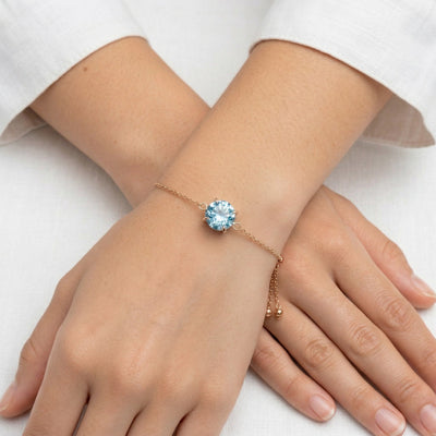 aquamarine birthstone bracelet in rose gold finish — model view