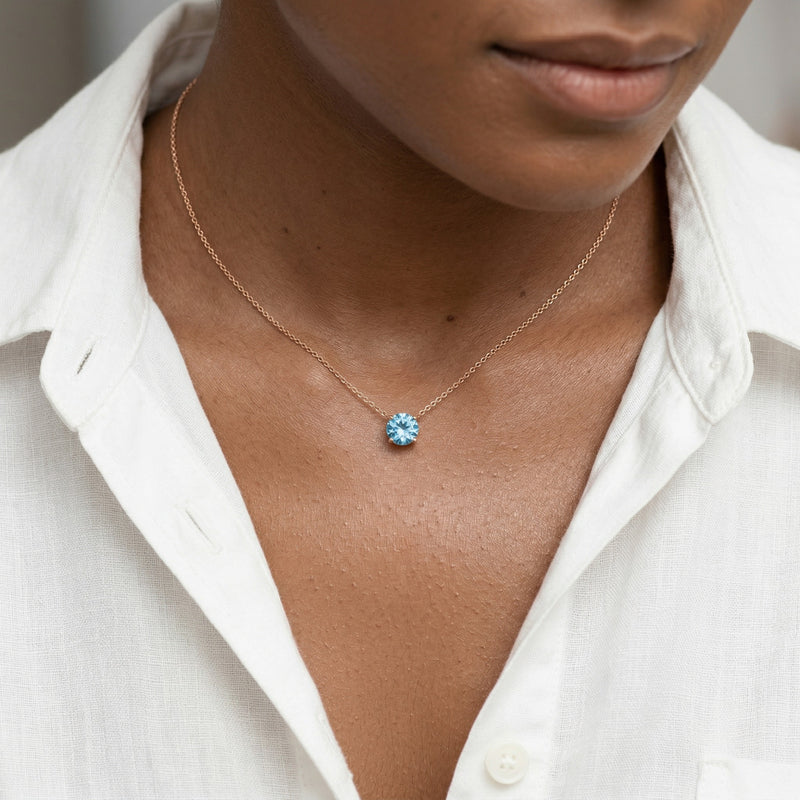 aquamarine birthstone necklace in rose gold finish — model view
