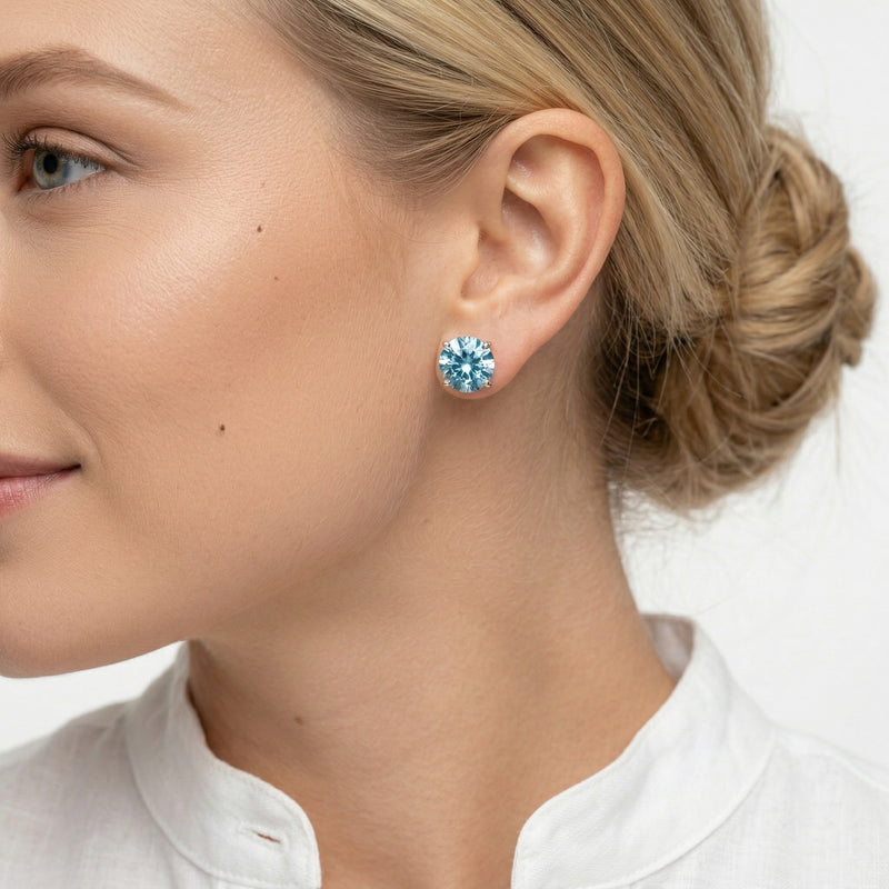 aquamarine birthstone stud earrings in white gold finish — model view