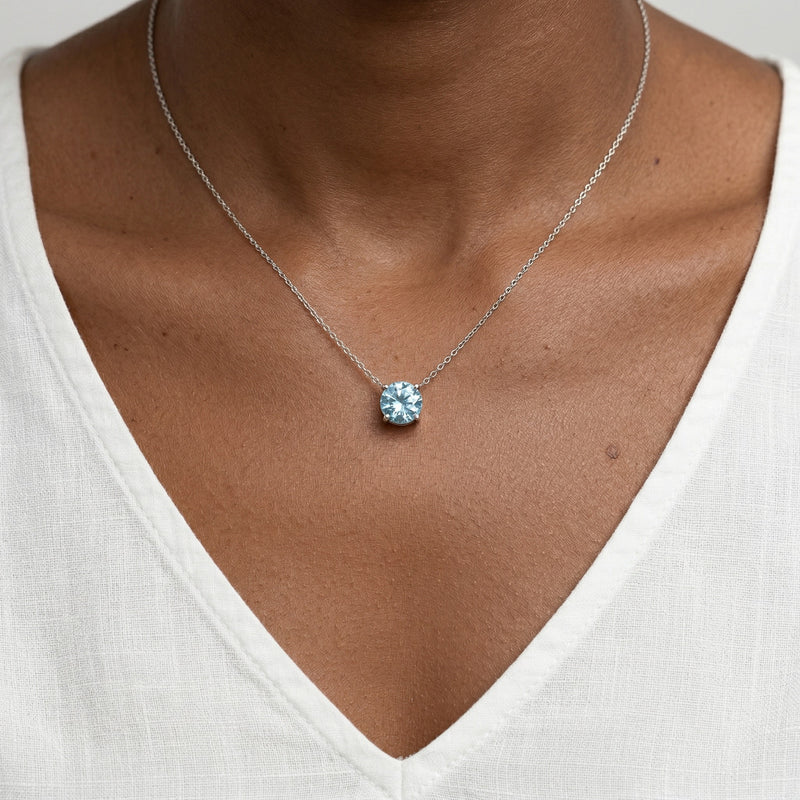 aquamarine birthstone necklace in white gold finish — model view