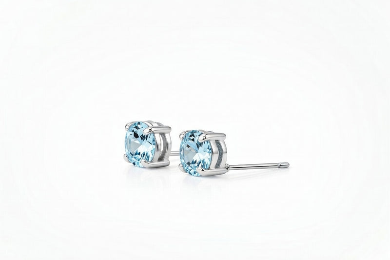 aquamarine birthstone stud earrings in white gold finish — side view
