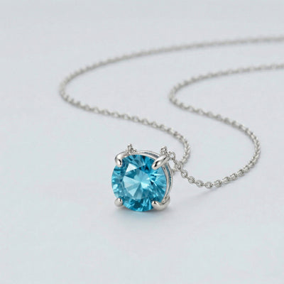 aquamarine birthstone necklace in white gold finish — side view