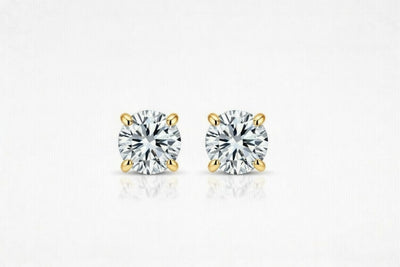 diamond birthstone stud earrings in yellow gold finish — front view