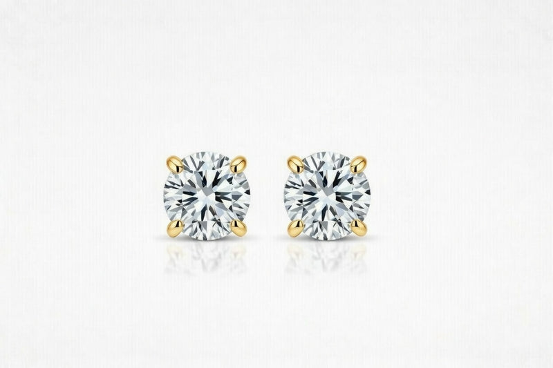 diamond birthstone stud earrings in yellow gold finish — front view