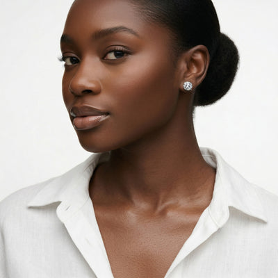 diamond birthstone stud earrings in white gold finish — model view
