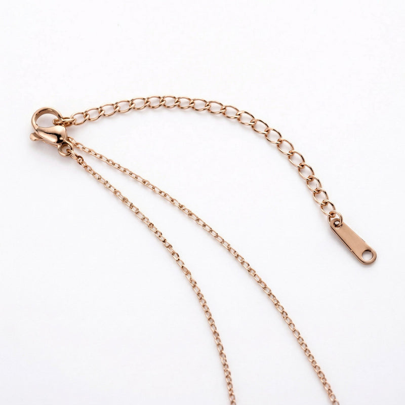 emerald birthstone necklace in rose gold finish — back view