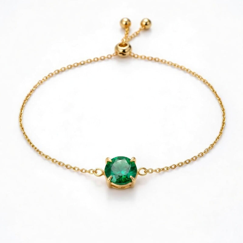 emerald birthstone bracelet in yellow gold finish — front view