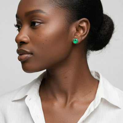 emerald birthstone stud earrings in rose gold finish — model view
